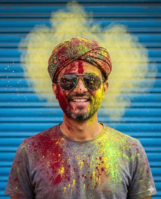 Vibrant Holi Festival Celebration: Joyful Man in Color Gemini Prompt